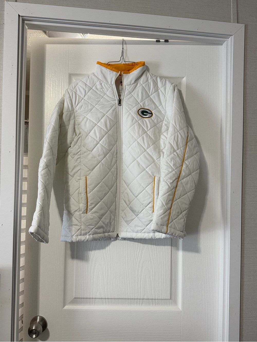 NFL White Quilted Puffer Jacket with Green & Gold Logo Accents